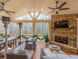 Soft seating around fireplace on covered deck