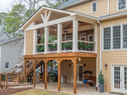 Gable roof porch with PVC columns and corner fireplace
