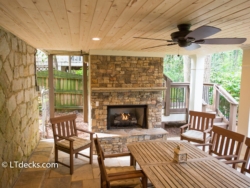 Fireplace below deck - Decatur, GA fireplace on patio