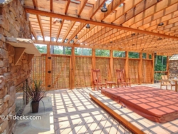 Sunken hot tub on a Trex deck with and outdoor fireplace sunken hot tub