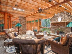 Deck with overhead arbor and a fireplace cedar arbor