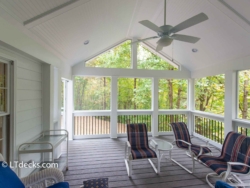 Screen porch with vaulted ceiling and PVC columns. screen porch interior