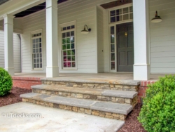 Wide stone steps leading to front door stone steps
