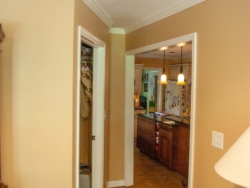 New opening into kitchen on right and new laundry room on left. door ways